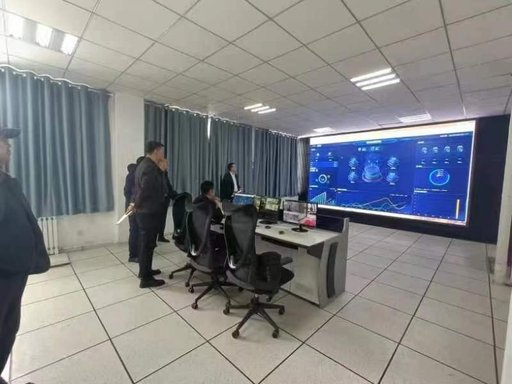 Central control room of the Edong water treatment plant with SCADA dashboard wall